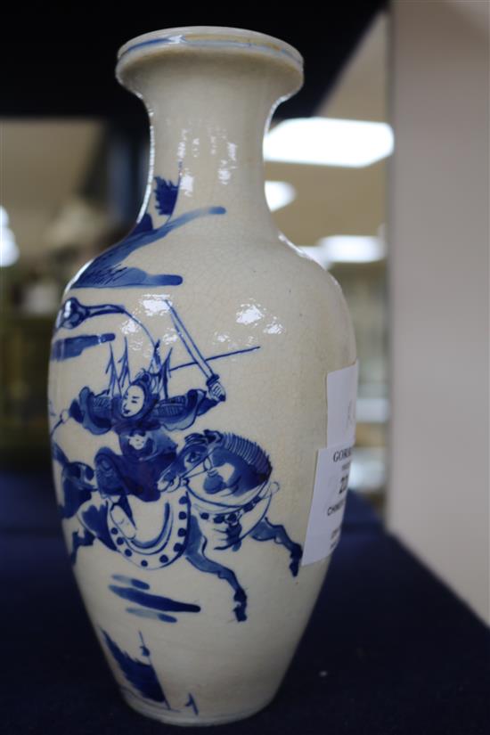 A Chinese blue and white soft paste porcelain vase, 18th century, with a Kangxi mark, 18cm